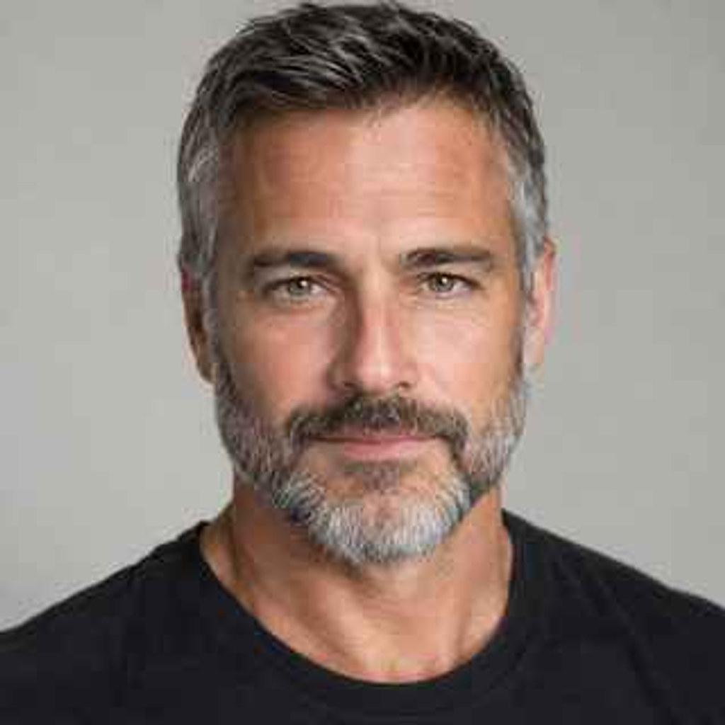 Image upscaling — a soft low-resolution portrait rebuilt at 4K, beard hairs and skin texture readable again